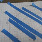 Tape off one direction to outline outer squares and center square