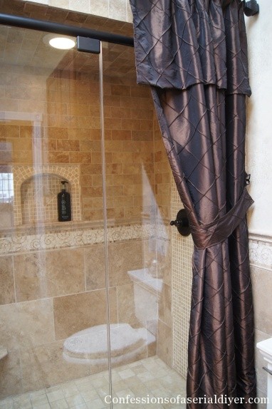master bathroom in travertine tile