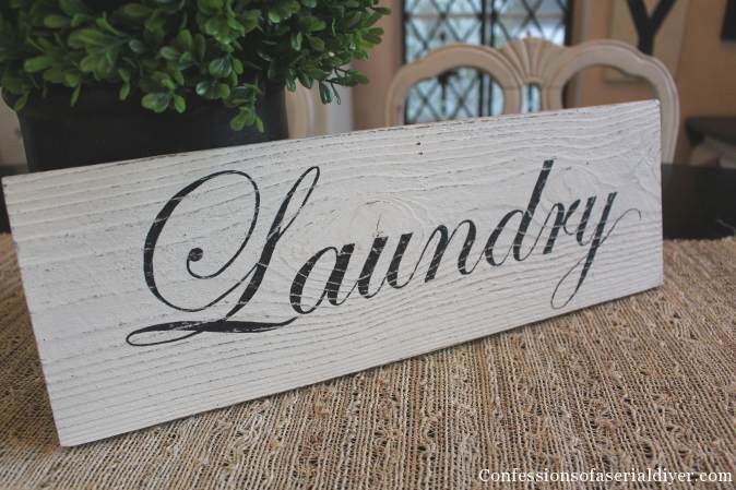 Laundry sign from an old fence picket