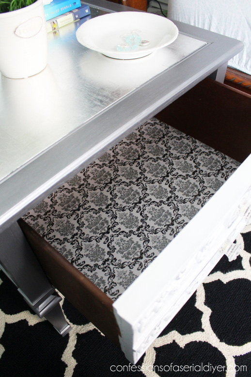 Thrift store throw away gets a glam makeover with silver leafing and metallic paint.