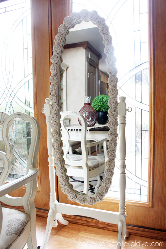 Rosette-Framed MIrror {Drop cloth is perfect for shabby rosettes!)