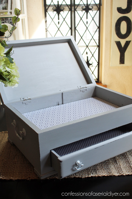 Flatware box made gorgeous with a little paint and fabric. Now it can hold more than just flatware!