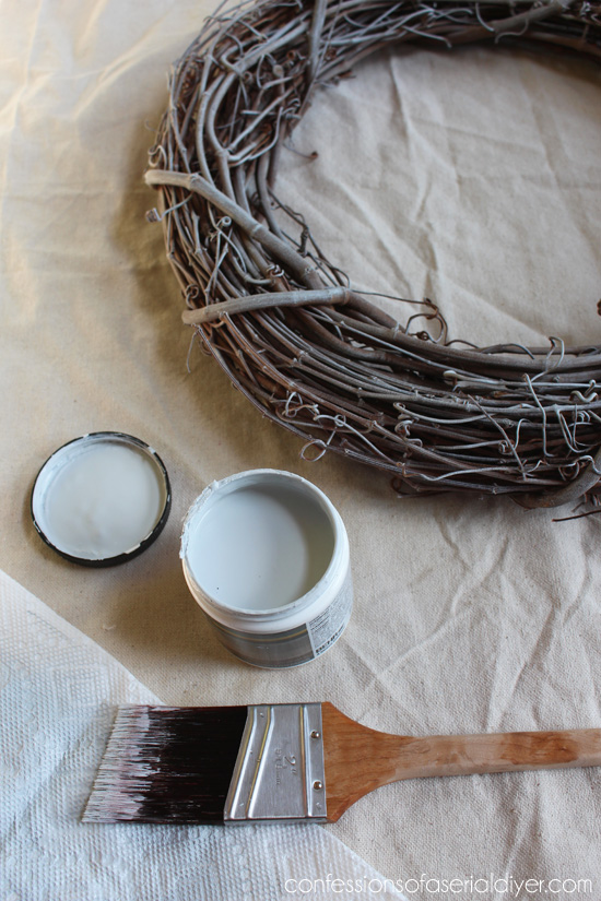 Dry brushing the grapevine wreath with soft gray paint first will give it a washed look, perfect for a Summer shell wreath