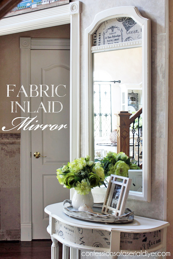 Vintage Mirror updated by adding fabric to the panel! confessionsofaserialdiyer.com