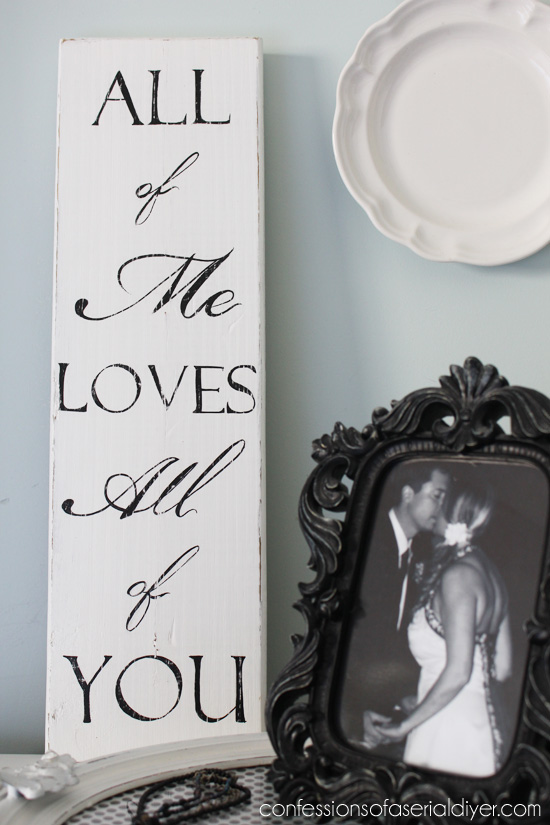 All of Me Loves All of You sign created from a curbside find 