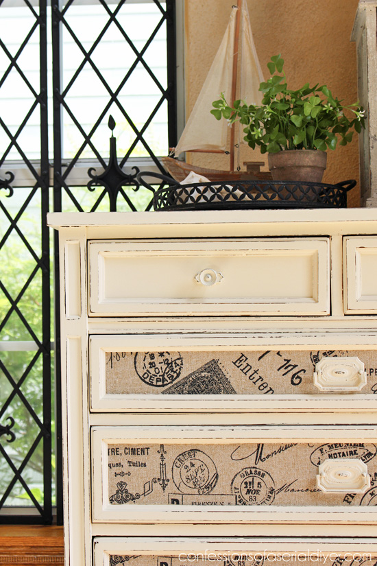 This thrifty dresser got a whole new look with some paint and fabric!