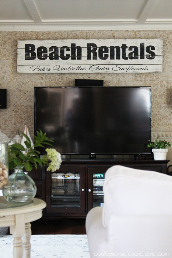 This beachy sign was made from old fence pickets. Confessions of a Serial Do-it-Yourselfer