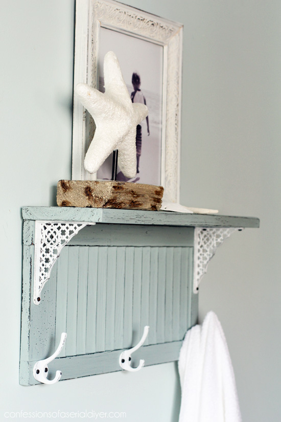 Cute and functional shelf made byrepurposing a small shutter from Confessions of a Serial Do-it-Yourselfer