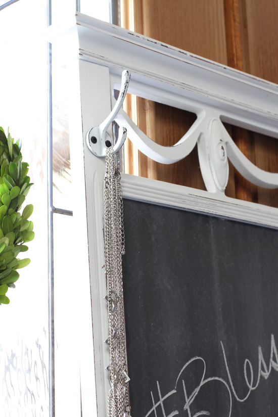 Adding hooks to this mirror turned chalkboard adds even more function.