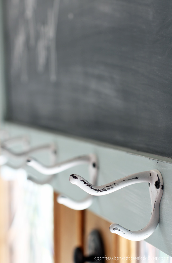 Add hooks to a chalkboard to add even more function!