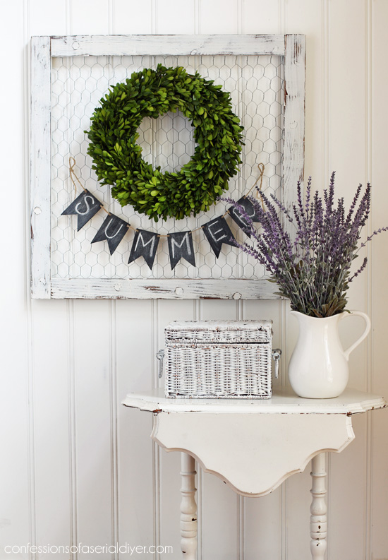 A frame of chicken wire makes a perfect backdrop for a wreath! This one was a dated Fall print to start.