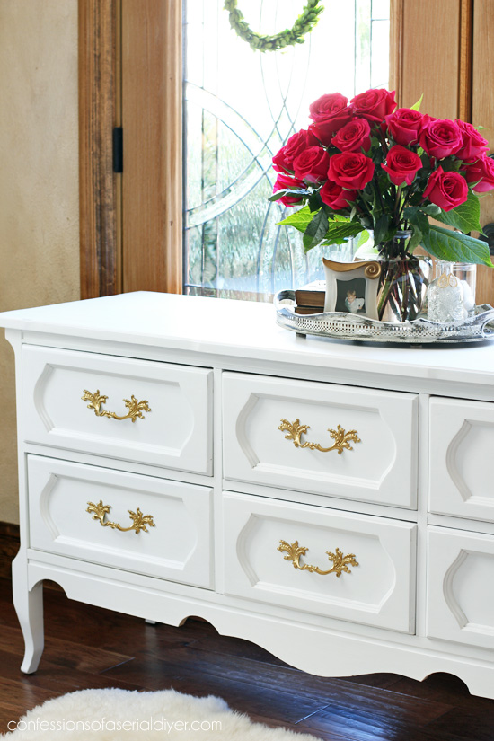 White Painted Vintage Dresser Makeover from confessionsofaserialdiyer.com