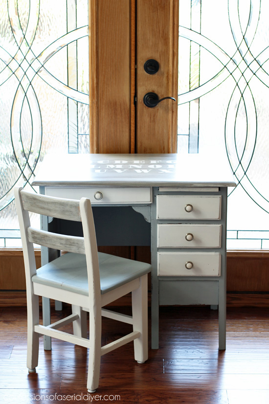 Child's antique desk with a weathered wood top and chalk painted bottom from confessionsofaserialdiyer.com
