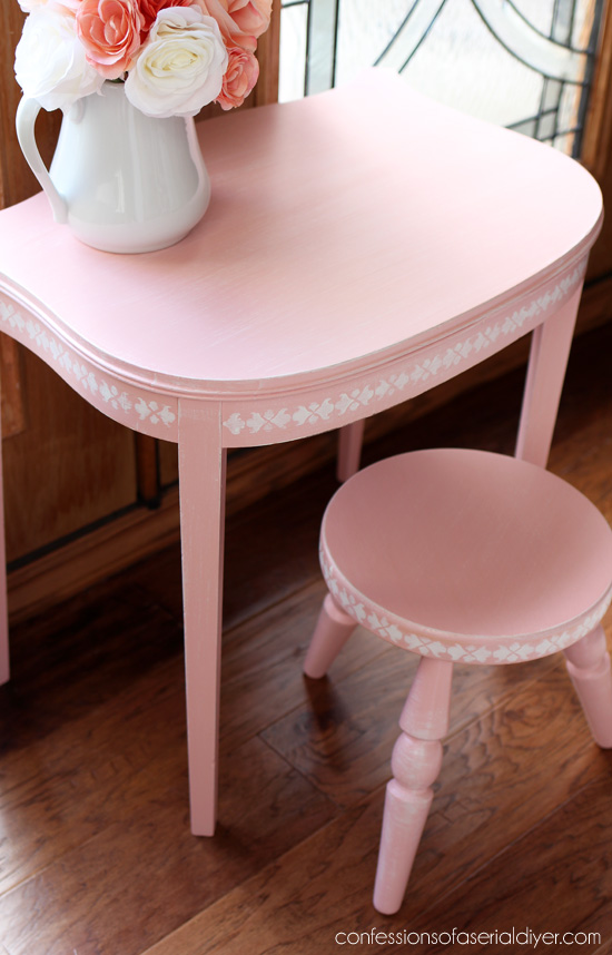 Little girl's vanity set from an antique side table and stool. confessionsofaserialdiyer.com
