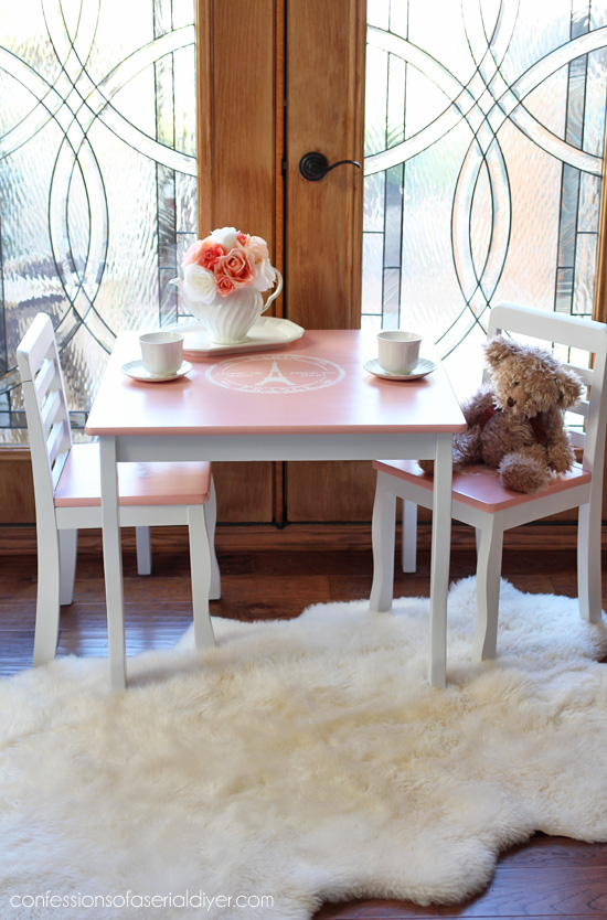 Girl's Table and chair set painted and stenciled with a french-inspired theme from Confessions fo a Serial DIYer
