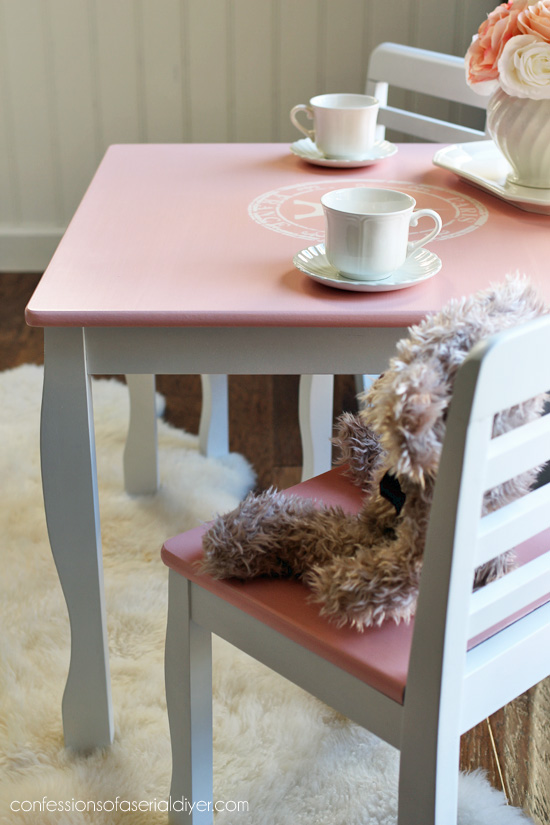 Girl's Table and chair set painted and stenciled with a french-inspired theme from Confessions fo a Serial DIYer