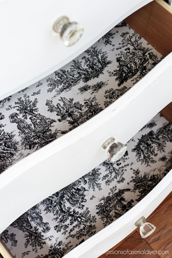 Love black toile to line the drawers of white-painted pieces. 