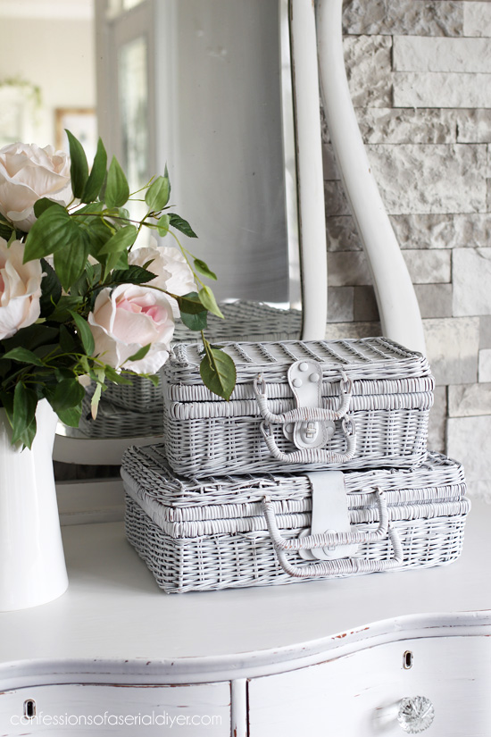 Picnic baskets spray painted and stacked make great decor!