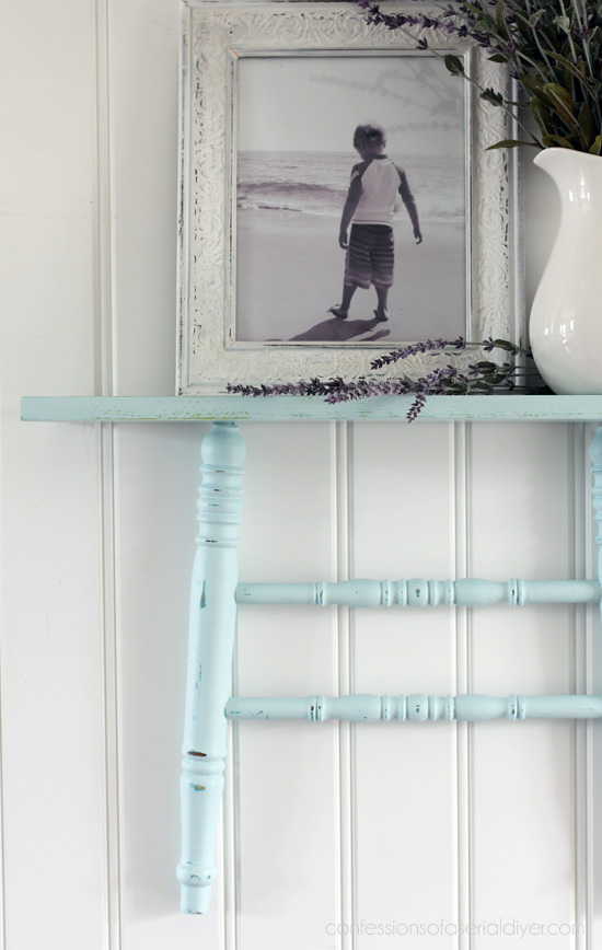 Shelf made from repurposing chair legs from confessionsofaserialdiyer.com