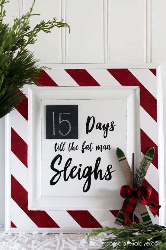 Cabinet door turned Christmas Countdown from confessionsofaserialdiyer.com