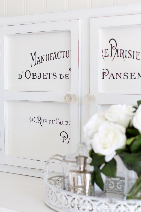 Dated wall cabinet gets a makeover with chalk paint and French typography.