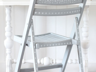 Stenciled wooden folding chair