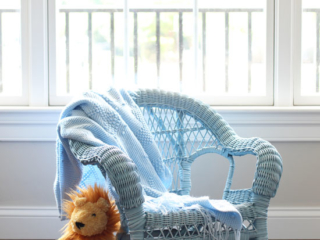 Child's wicker rocker spray painted in French Blue by Rust-Oleum.