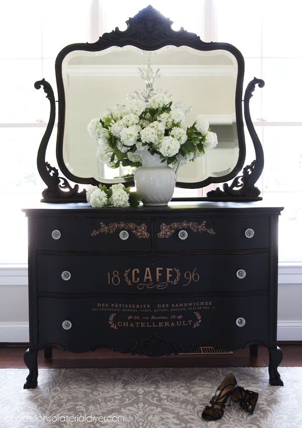 Black painted antique serpentine dresser with transfer