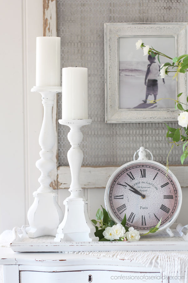 White painted candlesticks