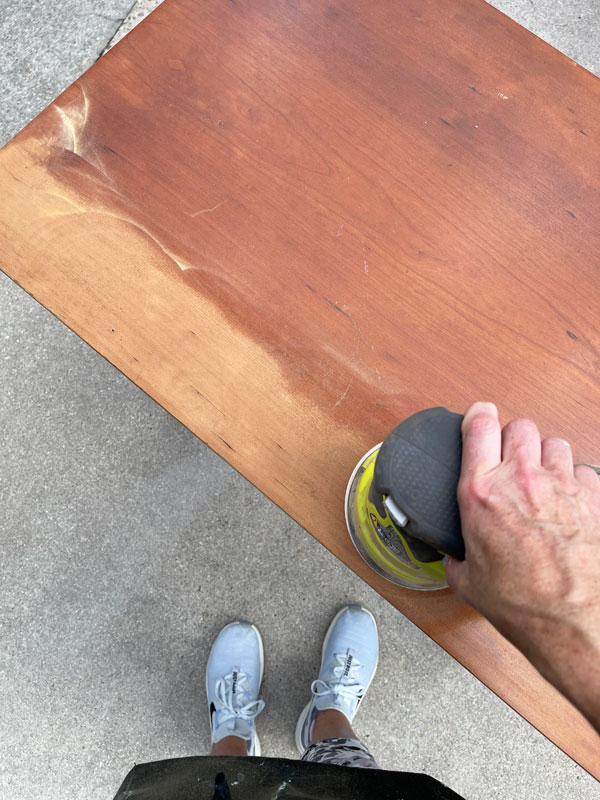 Rotary sander for removing stain