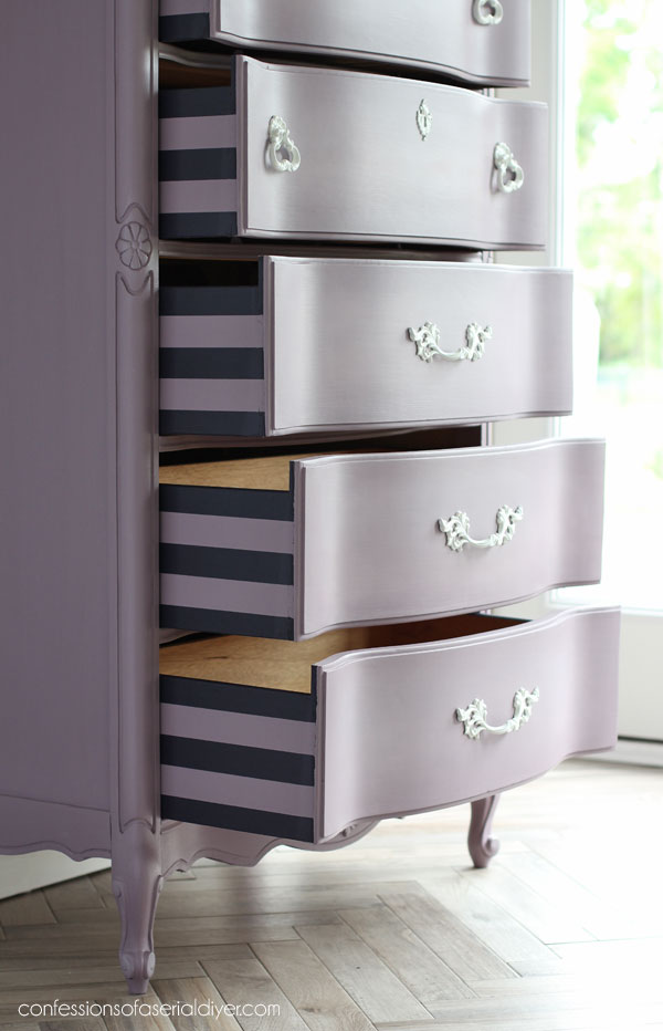 Painting stripes on the sides of drawers adds a fun touch!