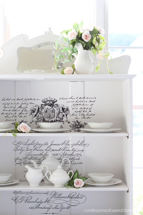 White Painted Bookcase Makeover with Parisian Letter transfer