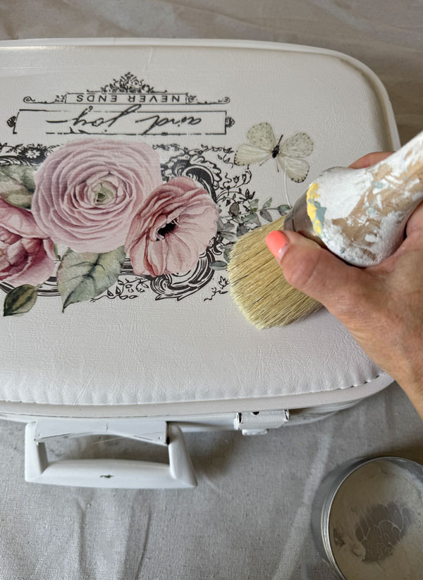 Sealing a vinyl suitcase with wax