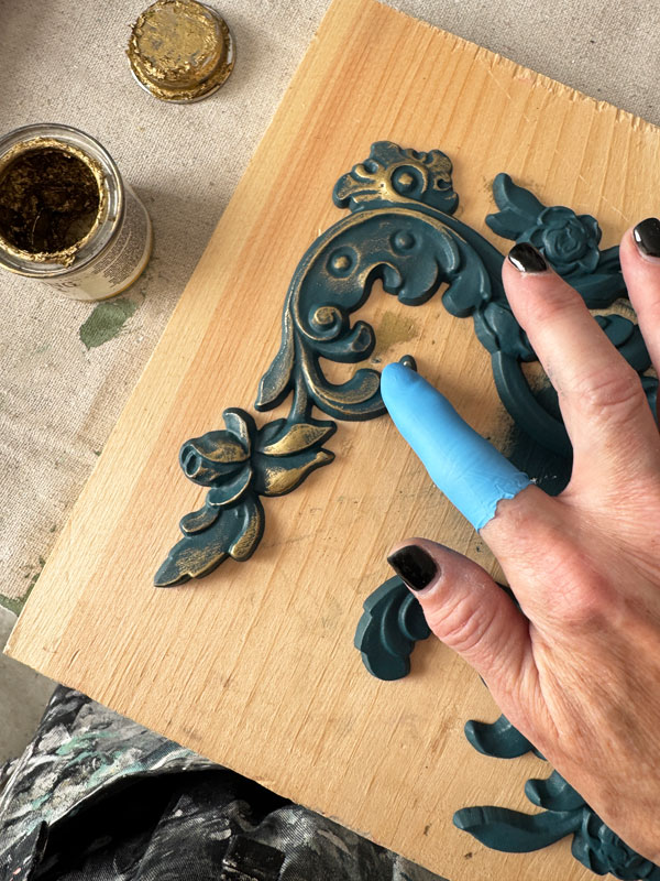 Gold Gilding wax on decor poly.