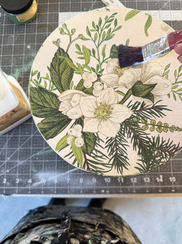 Use satin Clear Coat from Dixie Belle to apply decoupage paper