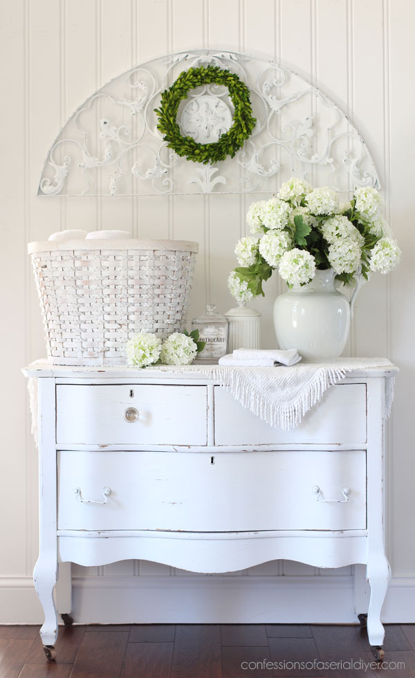 White wash a basket with paint.