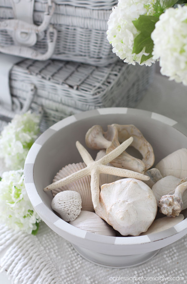 Then, to add some coastal flair, I used FrogTape for Delicate surfaces to mark out stripes all around the top. I used Cotton for the stripes and removed the tape as soon as the second coat went on: