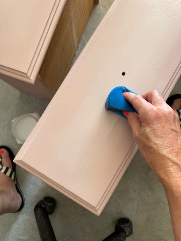 Applying Clear Coat from Dixie Belle with the blue sponge applicator