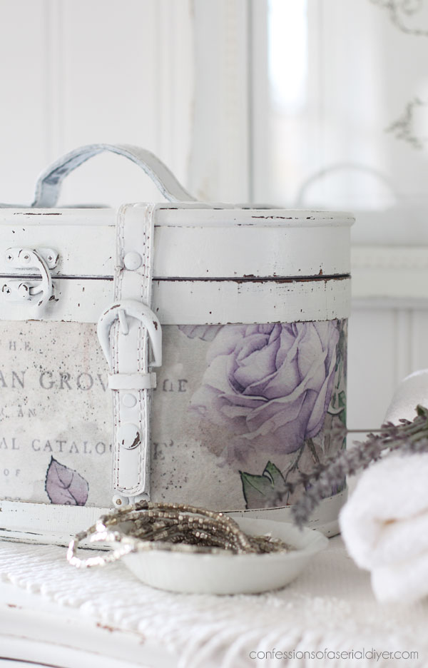 Round wooden storage box makeover with decoupage paper.