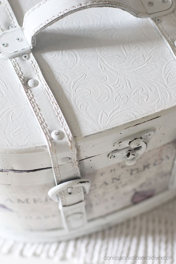 Round wooden storage box makeover with decoupage paper.