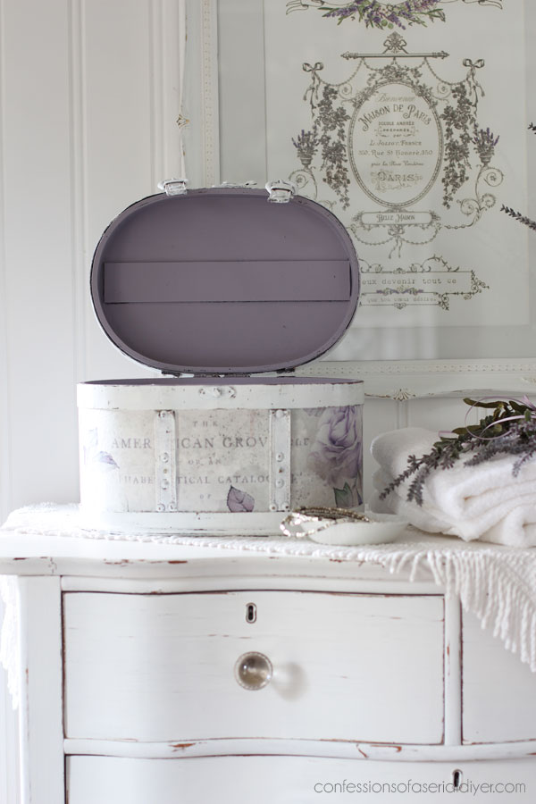 Round wooden storage box makeover with decoupage paper.