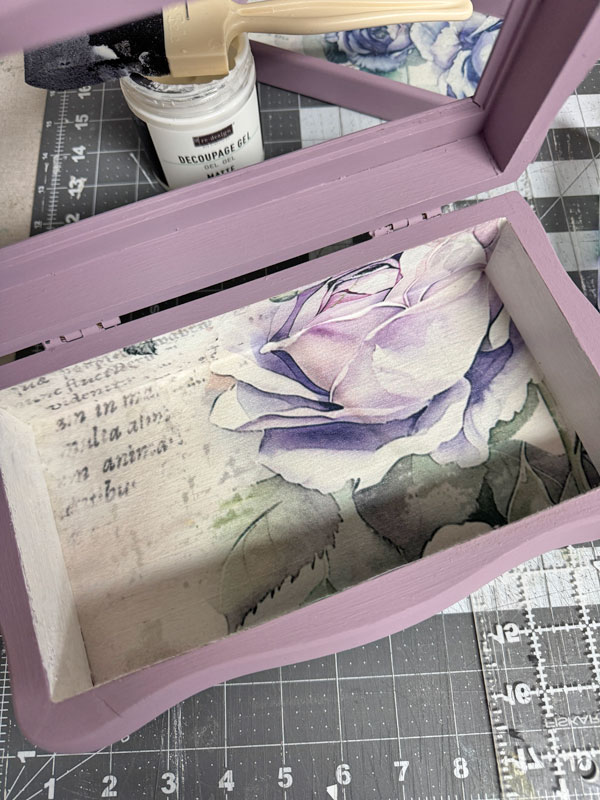 Decoupage the inside of a jewelry box.