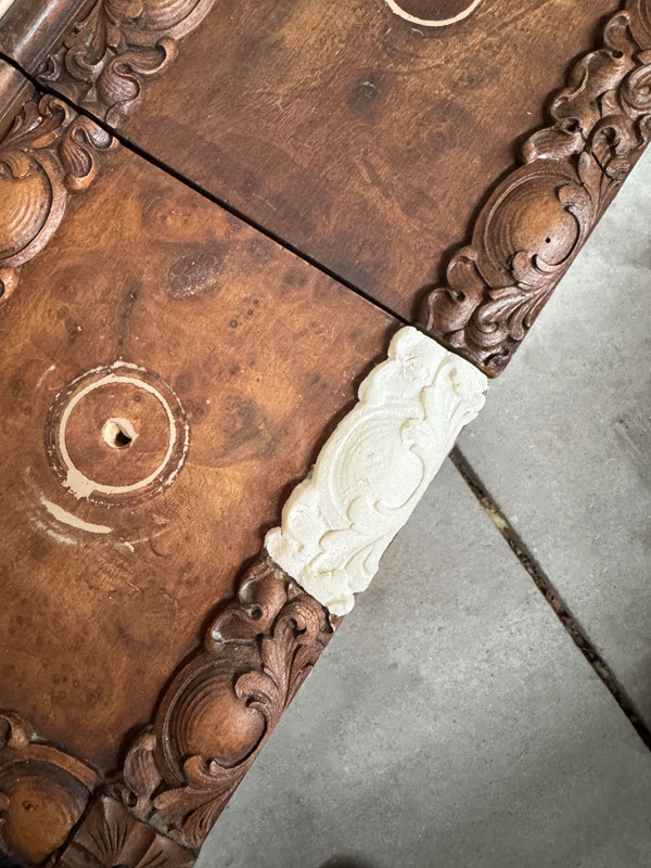 Replicate a piece of trim detail with clay and resin.