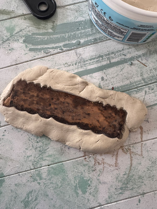 Replicate a piece of trim detail with clay.
