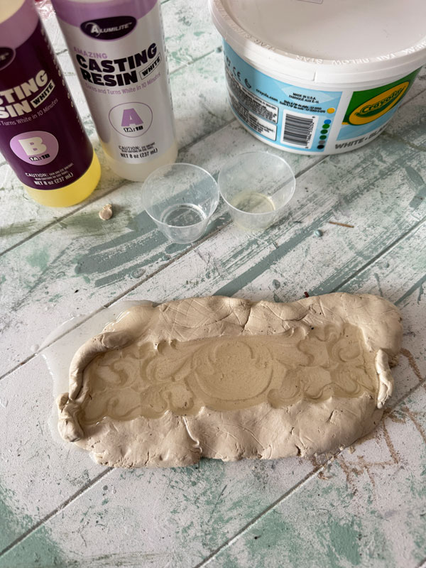 Replicate a piece of trim detail with clay and resin.
