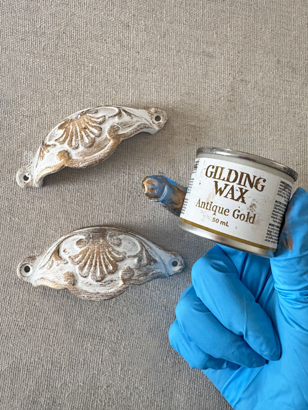 Add a dusting of gold to pulls with gilding wax.
