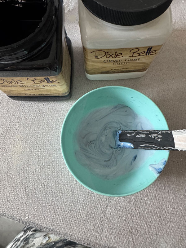 Adding a touch of paint to your sealer, when painting, dark pieces will give you a better finished result.