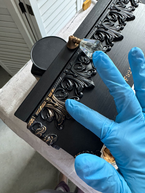 Highlighting the details with Antique Gold Gilding Wax from Dixie Belle.