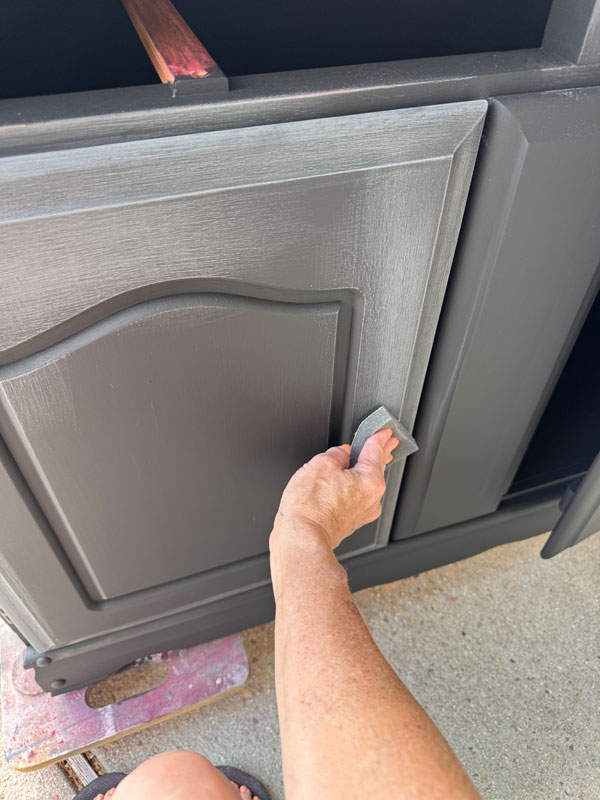 Sand your chalk painted finish with a fine grit sanding sponge.