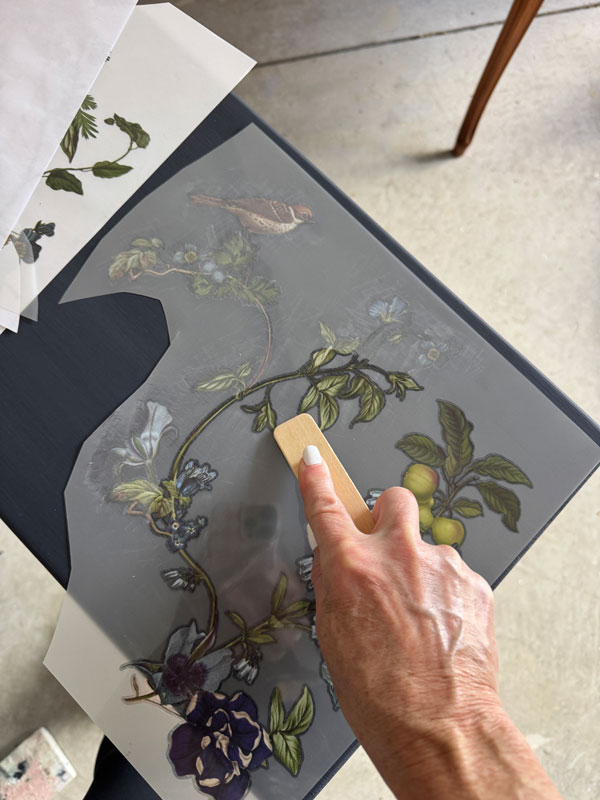 Chirping Charm Transfer on a console table